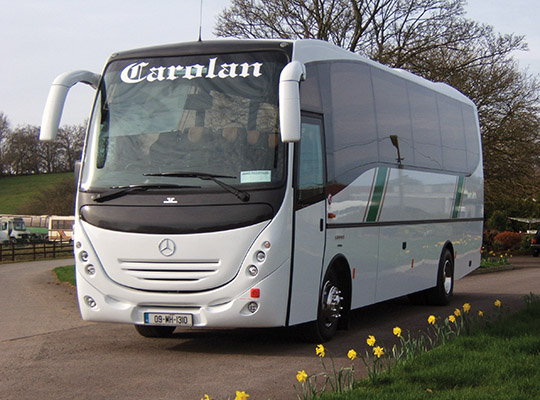 Carolan Coaches has grown from providing local services with one minibus to become one of the premier coach operators on the island.)
